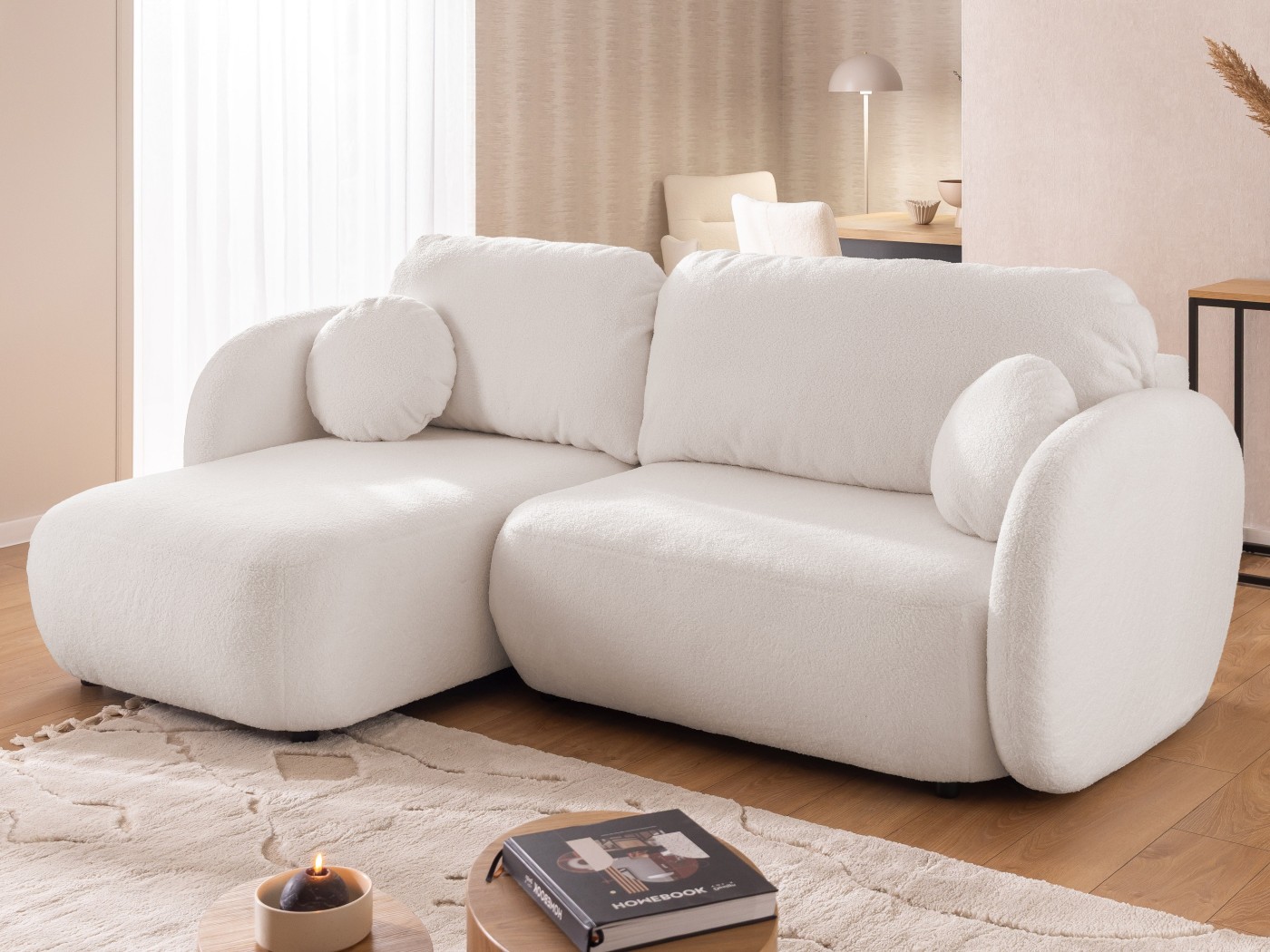 Candy - Modernes Ecksofa in L-Form mit Schlaffunktion und Stauraum aus Bouclé-Stoff, abgerundetes Design und hoher Sitzkomfort