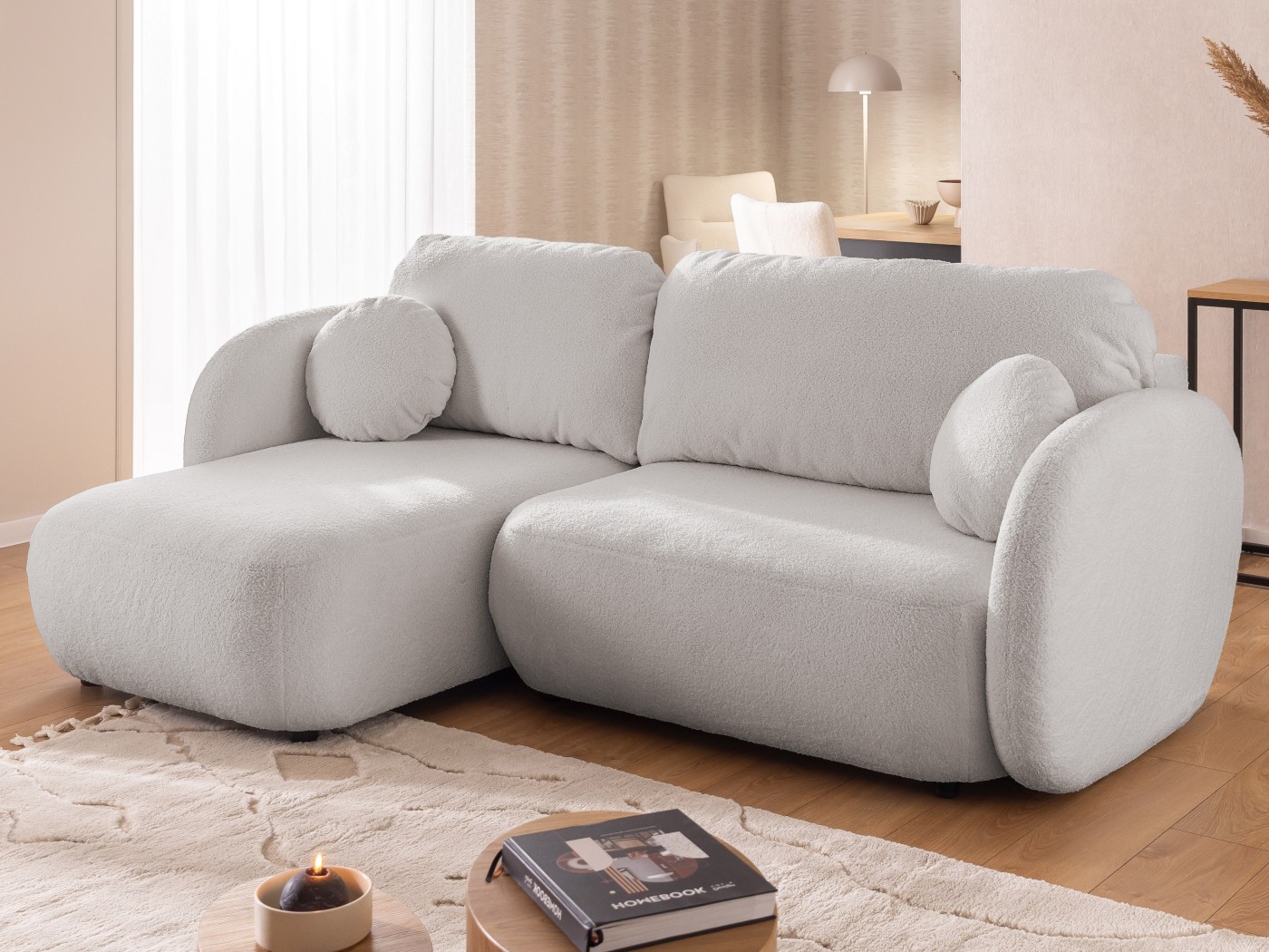 Candy - Modernes Ecksofa in L-Form mit Schlaffunktion und Stauraum aus Bouclé-Stoff, abgerundetes Design und hoher Sitzkomfort