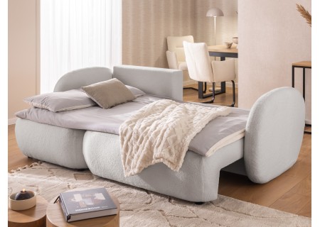 Candy - Modernes Ecksofa in L-Form mit Schlaffunktion und Stauraum aus Bouclé-Stoff, abgerundetes Design und hoher Sitzkomfort