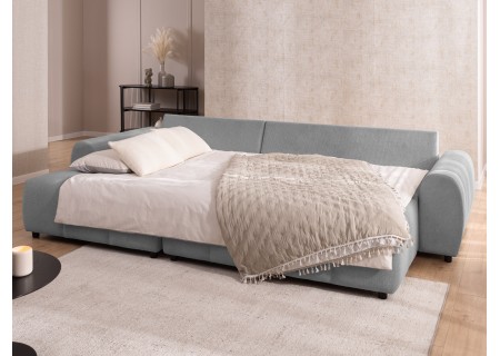 Bubble - Ecksofa mit Schlaffunktion und Hocker mit losen Rückenkissen und Sitzfläche in Bubble-Optik aus weichem Strukturstoff