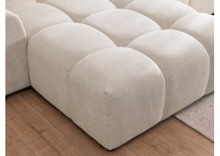 Bubble - Ecksofa mit Schlaffunktion und Hocker mit losen Rückenkissen und Sitzfläche in Bubble-Optik aus weichem Strukturstoff