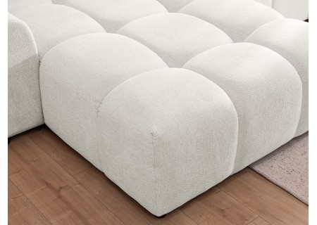 Bubble - Ecksofa mit Schlaffunktion und Hocker mit losen Rückenkissen und Sitzfläche in Bubble-Optik aus weichem Strukturstoff