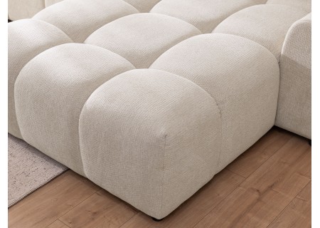 Bubble - Ecksofa mit Schlaffunktion und Hocker mit losen Rückenkissen und Sitzfläche in Bubble-Optik aus weichem Strukturstoff